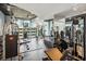 Well-equipped fitness center with various machines, free weights, and mirrored walls for a complete workout at 860 Peachtree Ne St # 2716, Atlanta, GA 30308