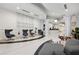This is a view of the lobby with seating and modern art on the wall at 860 Peachtree Ne St # 2716, Atlanta, GA 30308