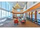 Spacious two-story lounge area with comfortable seating and a study bar at 860 Peachtree Ne St # 2716, Atlanta, GA 30308