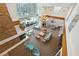 Two-story lounge area with modern fireplace, lighting, and comfortable seating at 860 Peachtree Ne St # 2716, Atlanta, GA 30308