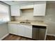 Kitchen features stainless steel appliances, granite countertops, and white cabinets at 927 Pine Oak Trl, Austell, GA 30168