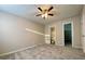 Main bedroom with carpet flooring, closet, and connected bathroom at 927 Pine Oak Trl, Austell, GA 30168