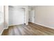 Cozy bedroom with hardwood floors, closet, and natural light at 1700 John Calvin Ave, Atlanta, GA 30337