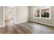 Bright room with hardwood floors, neutral paint, and natural lighting at 1700 John Calvin Ave, Atlanta, GA 30337