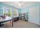 Bedroom featuring 2 windows with blinds, blue walls, ceiling fan, and closet at 210 Cole Ct, Canton, GA 30114