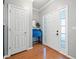 Inviting entryway with hardwood floors, a blue accent table, and a bright interior at 210 Cole Ct, Canton, GA 30114