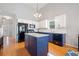 Bright eat-in kitchen features white cabinets, granite countertops, and stainless steel appliances at 210 Cole Ct, Canton, GA 30114