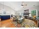 Spacious living room with hardwood floors, a fireplace, and an open layout at 210 Cole Ct, Canton, GA 30114