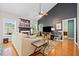 Cozy living room offers hardwood floors, a fireplace, and lots of natural light at 210 Cole Ct, Canton, GA 30114