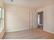 Neutral bedroom with a double door closet and carpet floors at 4354 Favored Way, Union City, GA 30291