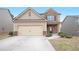 Charming two-story home with a two car garage and landscaped front yard at 4354 Favored Way, Union City, GA 30291