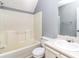 Functional bathroom with a shower-tub combo, toilet, and vanity with sink at 495 Stratford Dr, Douglasville, GA 30134