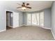 Bright bedroom with carpet, ceiling fan and bay window at 495 Stratford Dr, Douglasville, GA 30134