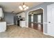 Open kitchen view into the living room with stainless steel appliances at 495 Stratford Dr, Douglasville, GA 30134