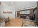 Modern kitchen features stainless steel appliances, brick accents, and stylish lighting at 65 Peachtree Memorial Nw Dr # 5, Atlanta, GA 30309