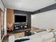 Stylish living room with modern decor, a sleek entertainment center, and a comfortable sofa at 65 Peachtree Memorial Nw Dr # 5, Atlanta, GA 30309