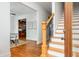 Inviting foyer featuring hardwood floors and staircase at 68 Spence Se Ave, Atlanta, GA 30317