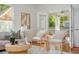 Comfortable living room with neutral tones and French doors at 68 Spence Se Ave, Atlanta, GA 30317