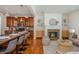 Open concept kitchen and living room with barstool seating at 68 Spence Se Ave, Atlanta, GA 30317