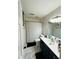 Well-maintained bathroom with a shower featuring a shower curtain, toilet, and vanity sink at 115 Winding River Dr # B, Atlanta, GA 30350
