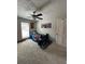 Bedroom featuring carpet, window, and a ceiling fan at 115 Winding River Dr # B, Atlanta, GA 30350