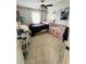 Cozy bedroom featuring two beds, plush carpeting, and a ceiling fan for comfortable living at 115 Winding River Dr # B, Atlanta, GA 30350