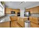 Kitchen with granite countertops, stainless steel appliances, hardwood floors, and center island at 302 Wickley Way, Woodstock, GA 30188