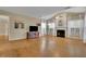 Spacious living room with hardwood floors, fireplace and lots of natural light at 302 Wickley Way, Woodstock, GA 30188