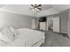 This spacious main bedroom features a tray ceiling, neutral decor and plenty of closet space at 3978 Oak Crossing Drive Dr, Suwanee, GA 30024