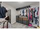 Spacious walk-in closet with custom shelving and drawers, providing ample storage for clothing and accessories at 3978 Oak Crossing Drive Dr, Suwanee, GA 30024