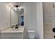 A spacious bathroom features a dual sink vanity, a soaking tub, and a glass-enclosed shower at 4409 Encore Park Lane, Duluth, GA 30097