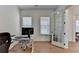 Office with hardwood floors, natural light, and a glass paneled door at 4409 Encore Park Lane, Duluth, GA 30097