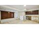 Large basement with wooden wall paneling with cutout for customization and renovations at 45 Willow Ne Gln, Atlanta, GA 30342