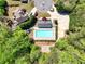 Birds eye view of a large rectangle pool, the clubhouse and the surrounding neighborhood at 453 Thorn Creek Way, Dallas, GA 30157