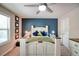 Bedroom with a feature wall, ceiling fan, neutral walls, and carpet at 453 Thorn Creek Way, Dallas, GA 30157