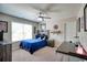 Bedroom featuring a ceiling fan, carpet, and a desk at 453 Thorn Creek Way, Dallas, GA 30157