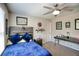 Bedroom featuring a ceiling fan, carpet, and a desk at 453 Thorn Creek Way, Dallas, GA 30157