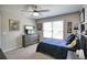 Bedroom featuring a ceiling fan, carpet, and a TV at 453 Thorn Creek Way, Dallas, GA 30157