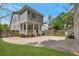 Picturesque home with a well-kept lawn, blooming flowers, and convenient parking area for modern living at 60 Spence Se Ave, Atlanta, GA 30317