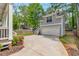 Detached garage with a private driveway, surrounded by well-maintained landscaping, perfect for convenience and storage at 60 Spence Se Ave, Atlanta, GA 30317