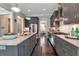 Well-lit kitchen features granite countertops, stainless steel appliances, and gray cabinetry at 60 Spence Se Ave, Atlanta, GA 30317