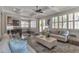 Bright living room with coffered ceiling, plantation shutters, and an open layout to kitchen at 60 Spence Se Ave, Atlanta, GA 30317