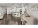 Bright, open kitchen featuring a large island with bar seating and stainless steel appliances at 216 Ellis Ln, Woodstock, GA 30189