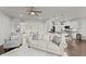 Open living space blends living and kitchen areas, with a comfortable sofa and modern decor at 216 Ellis Ln, Woodstock, GA 30189