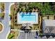 A community pool offers a refreshing escape, set beside modern townhomes and ample parking at 216 Ellis Ln, Woodstock, GA 30189