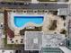 An aerial view of a luxury condo building with a swimming pool and lounge area at 250 Pharr Ne Rd # 905, Atlanta, GA 30305