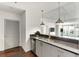 Modern kitchen featuring granite countertops, stainless steel appliances, and an open floor plan at 250 Pharr Ne Rd # 905, Atlanta, GA 30305