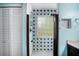Updated bathroom with tiled shower and built-in storage at 285 Willow Shoals Dr, Covington, GA 30016