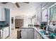 Bright kitchen features granite countertops, stainless steel appliances, and ample cabinet space at 285 Willow Shoals Dr, Covington, GA 30016