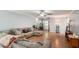 Spacious living room with wood floors, neutral decor, and ample seating for entertaining at 285 Willow Shoals Dr, Covington, GA 30016